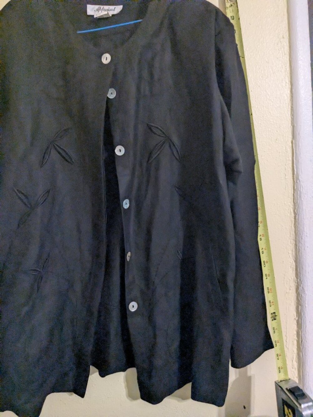 Black top or jacket.